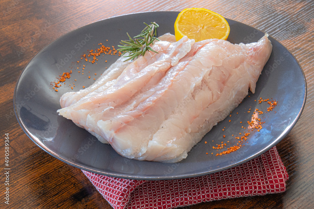 fillet of raw saithe with spices and herbs fillet of raw saithe with spices and herbs
