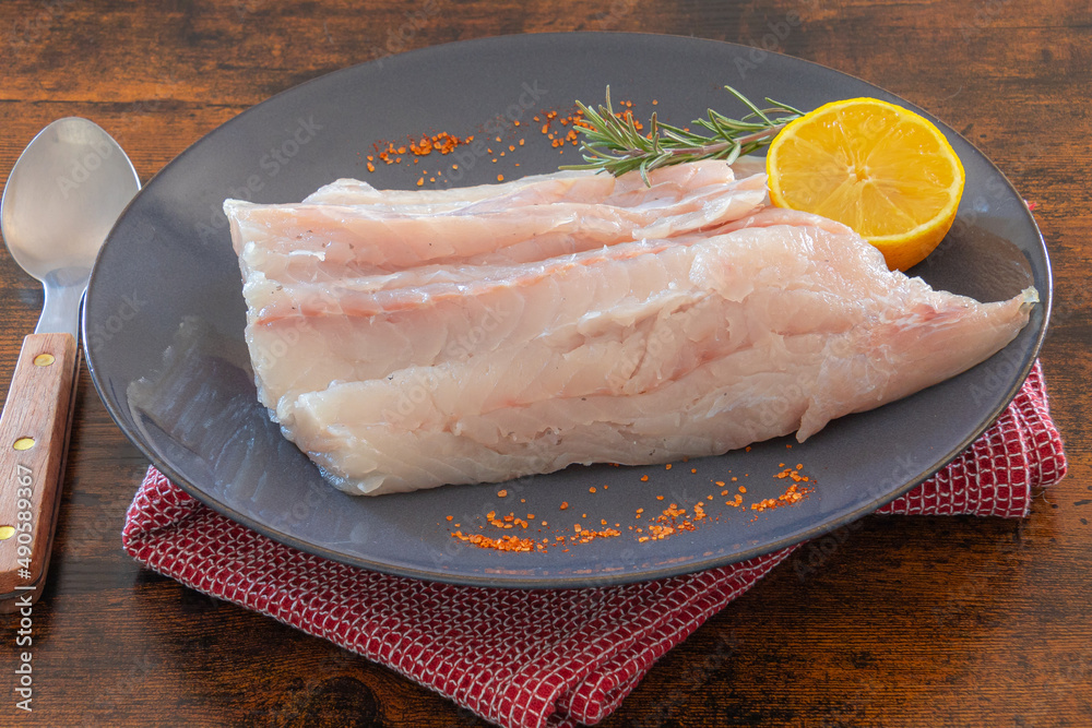 fillet of raw saithe with spices and herbs fillet of raw saithe with spices and herbs