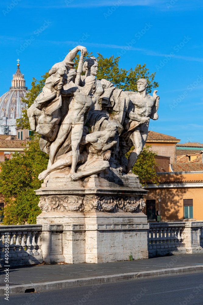 The sculpture on Vittorio Emanuele II Bridge, one of the allegorical groups decorating the bridge, Rome, Italy