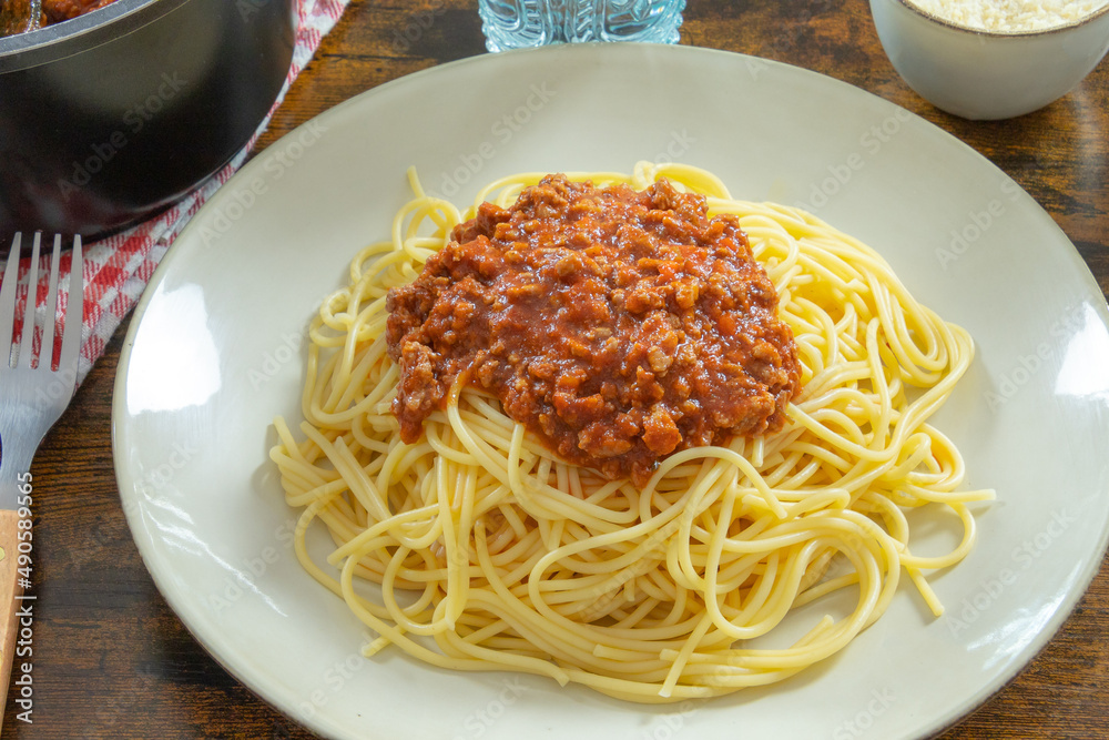 Delicious spaghetti bolognese in a white plate Delicious spaghetti bolognese in a white plate