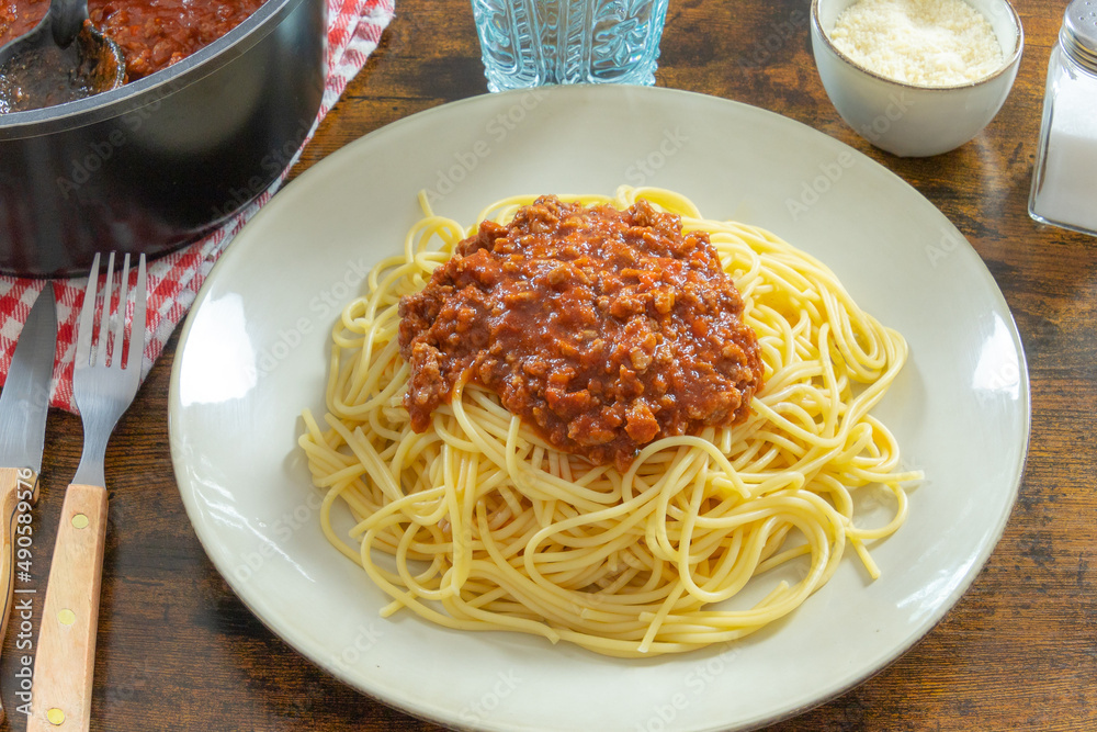 Delicious spaghetti bolognese in a white plate Delicious spaghetti bolognese in a white plate