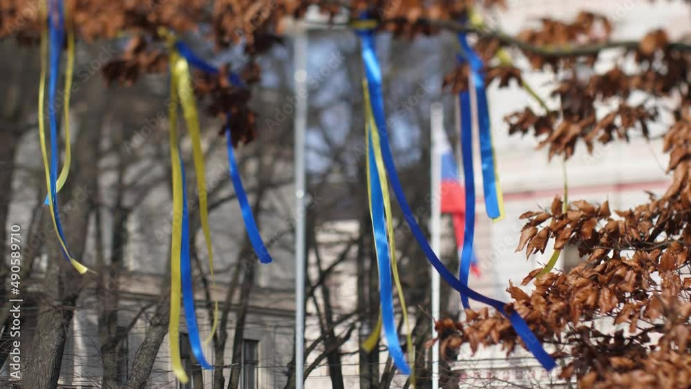 Ukrainian flag no war. Protest posters against Russia attack on Ukraine at the Russian Embassy in Latvia Ukrainian flag no war. Protest posters against Russia attack on Ukraine at the Russian Embassy in Latvia