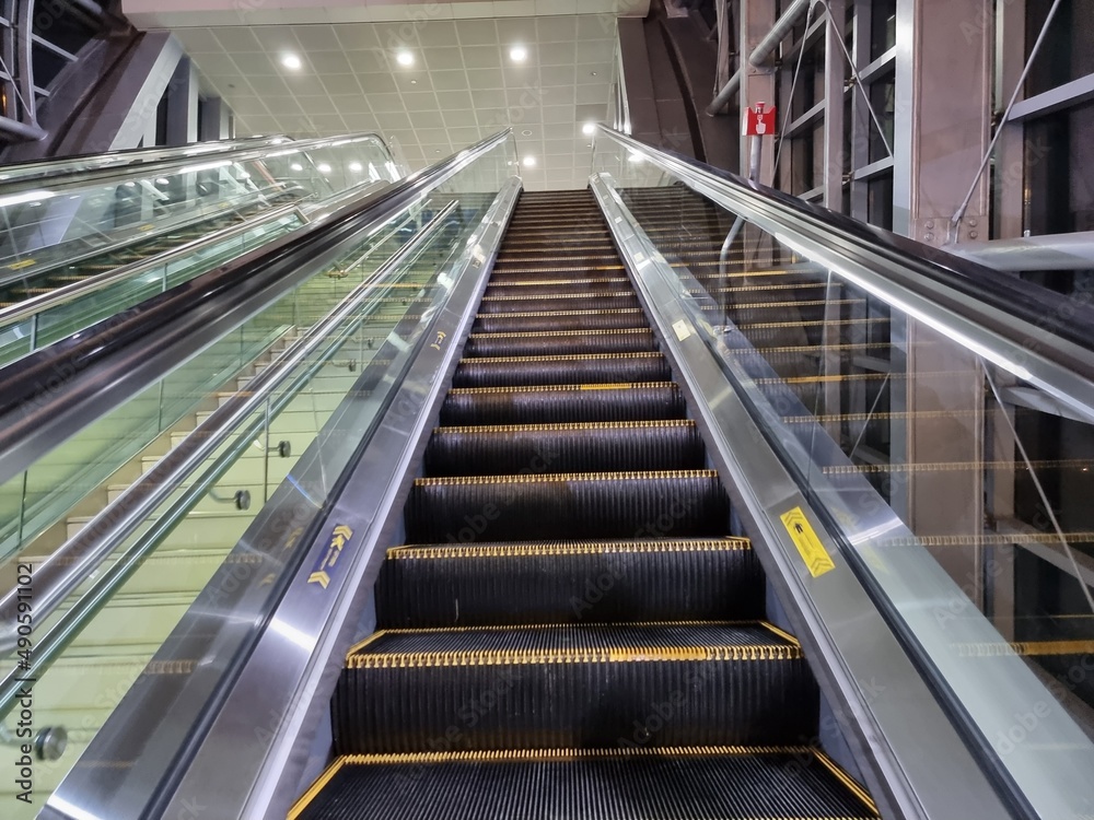 escalator in a Metro railway station , Dubai, UAE. escalator in a Metro railway station , Dubai, UAE.