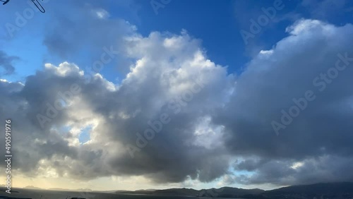 Timelapse de nubes al atardecer en la Ría de Vigo con las Islas Cíes de fondo photo
