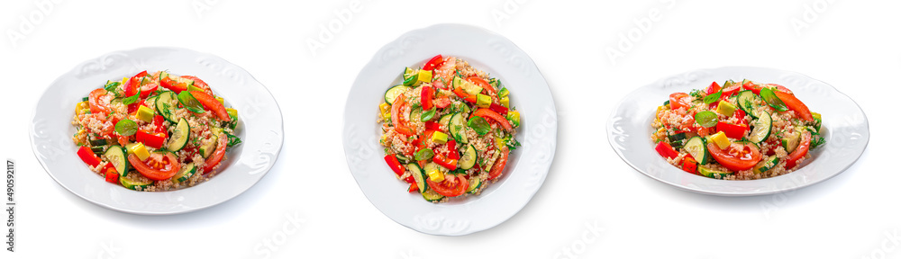Vegetable salad with quinoa, avocado and fresh herbs is isolated on a white background. Vegetable salad with quinoa, avocado and fresh herbs is isolated on a white background.