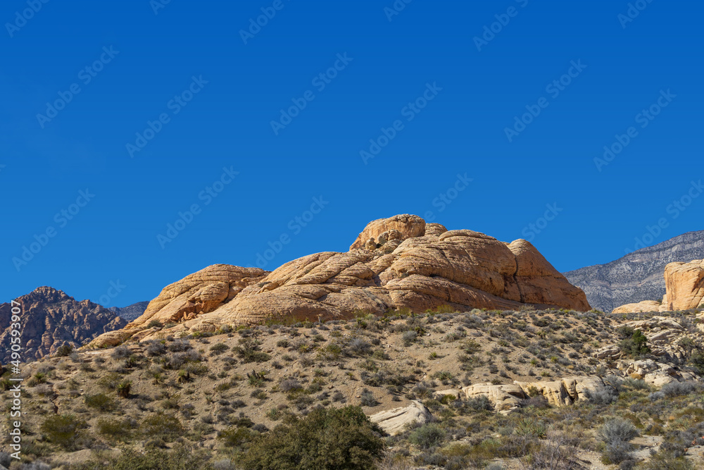 Large rock formation on a hill in the Red Rock Canyon area in Nevada