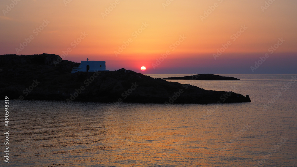 Famous chapel of Saint Ermolaos built in small island near Molos beach, Skiros island at dawn, Sporades, Greece