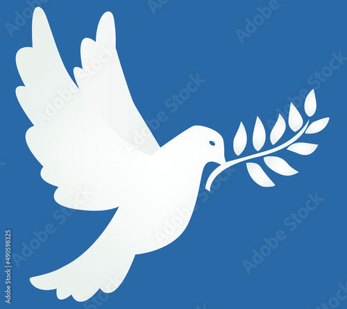 White dove of peace on the blue background. Symbol of hope and peace