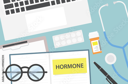hormone written in notebook on doctor desk - vector illustration