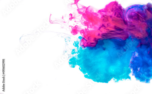 Creative color overflow concept of painting ink. An explosion of neon colors pink and blue on white background.