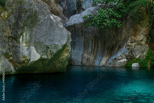 rocky canyon with blue water in Goynuk, Turkey