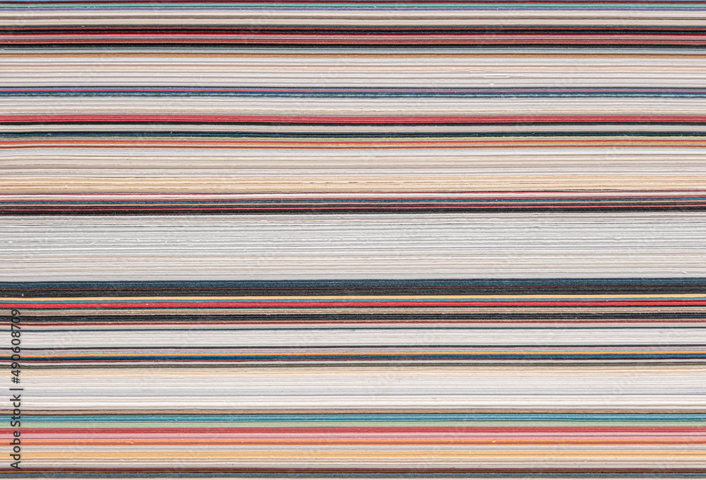 sheets of paper of various colors and thicknesses, cross section sheets of paper of various colors and thicknesses, cross section