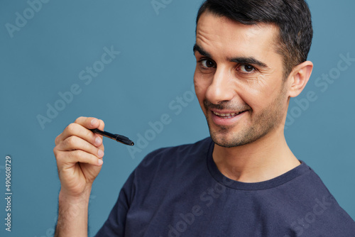 portrait man pen posing knowledge self confidence isolated background