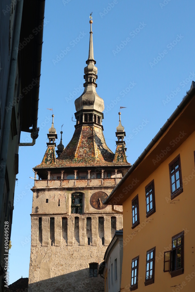 Fototapeta premium Glimpse on Sighisoaras famous Clock Tower from inside of the Citadel