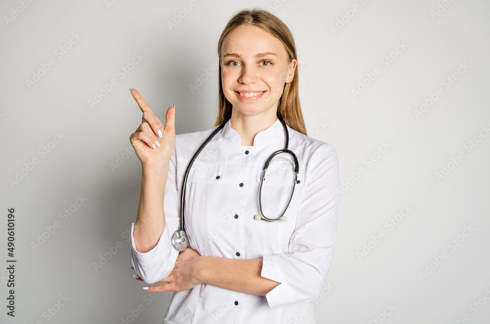 girl doctor shows from scratch. concept of future services, space for advertising girl doctor shows from scratch. concept of future services, space for advertising