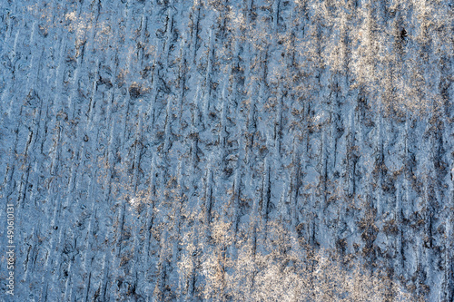 Top view of scarified and grooved concrete on a city road for overlay prep