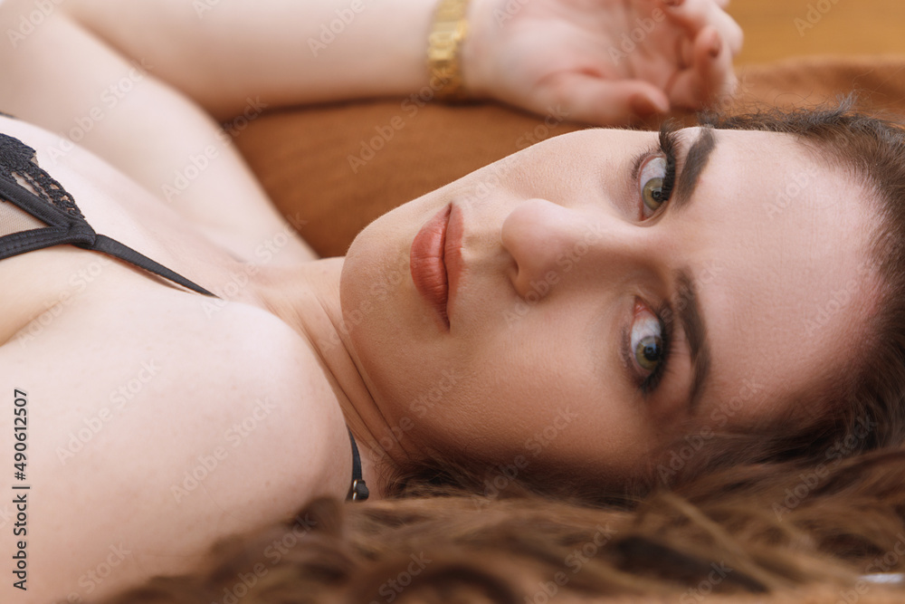 Cute Caucasian girl, blonde hair, wearing lingerie in a hotel room, sensualizing in a photo shoot Cute Caucasian girl, blonde hair, wearing lingerie in a hotel room, sensualizing in a photo shoot