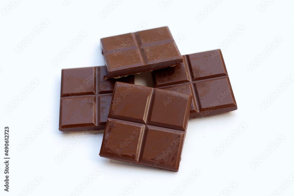 Square biscuits in dark chocolate