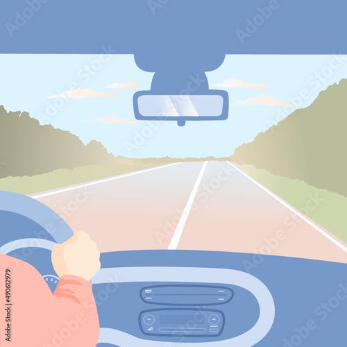 Driving a car on a highway 