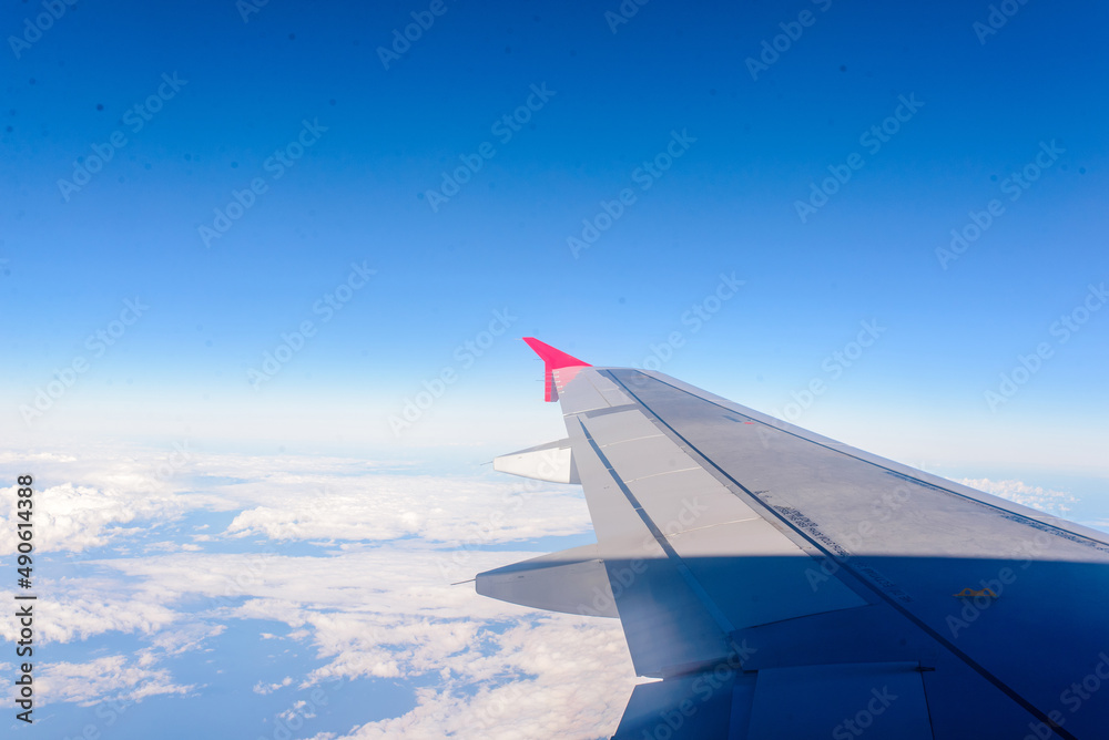 Wing aircraft against a background of blue sky