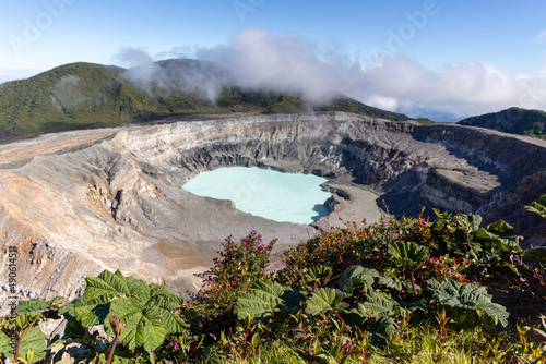 Volcano Poas with Turquoise crater lake in the rainforest of Costa Rica photo