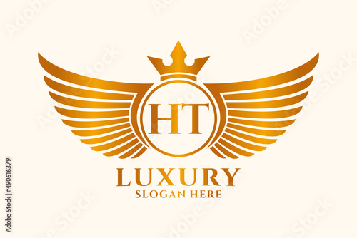 Luxury royal wing Letter HT crest Gold color Logo vector, Victory logo, crest logo, wing logo, vector logo template. photo