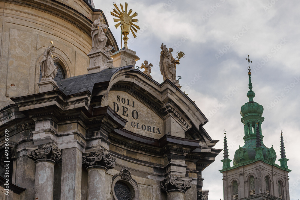 LVIV, UKRAINE - February, 2022: decorative elements of facade, Dominican church and monastery “Soli Deo Honor et Gloria”. 