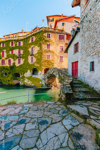 The medieval bridge, also called Civera bridge, in Village of Nesso on Lake Como. Orrido of Nesso,