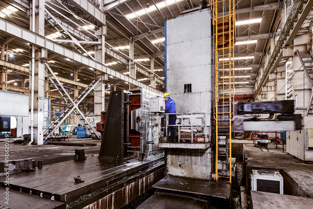 Scene view of large machine in production workshop of Asian factory