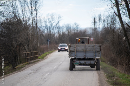 Wallpaper Mural Tractor with a trailer driving on the road. Torontodigital.ca