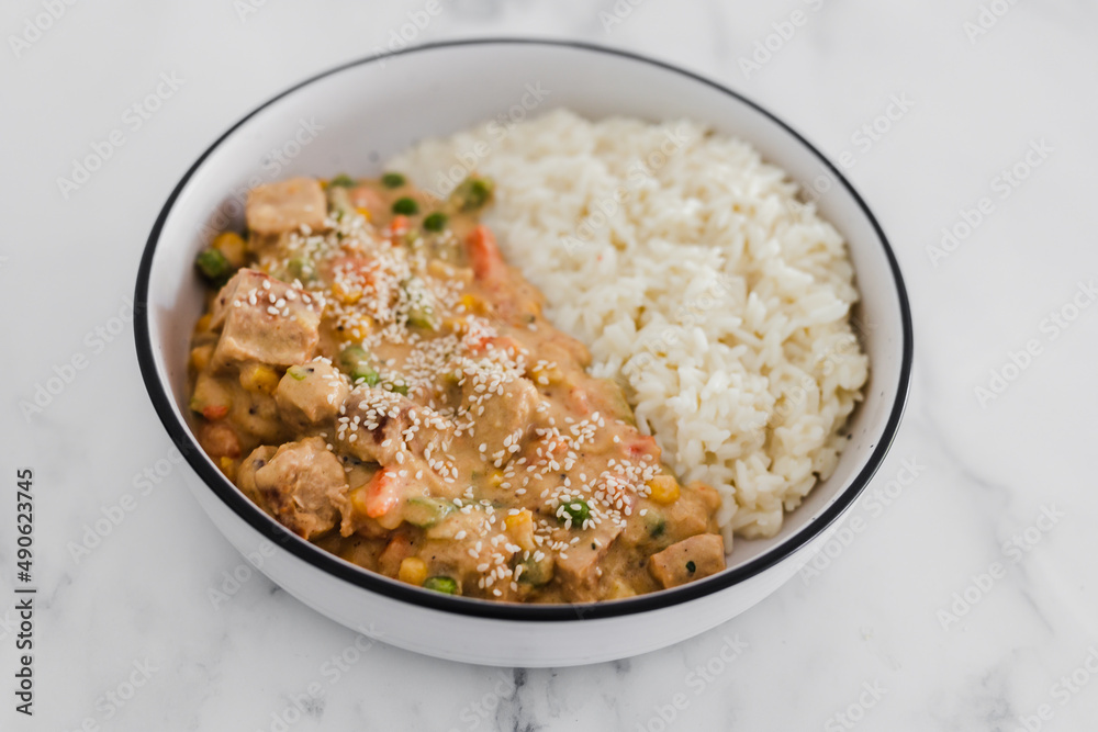vegan satay veggie stir fry with coconut milk rice, healthy plant-based food vegan satay veggie stir fry with coconut milk rice, healthy plant-based food