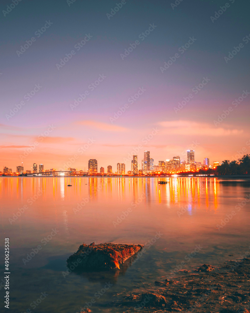 Fototapeta premium sunrise over the city miami usa florida reflections colors lights