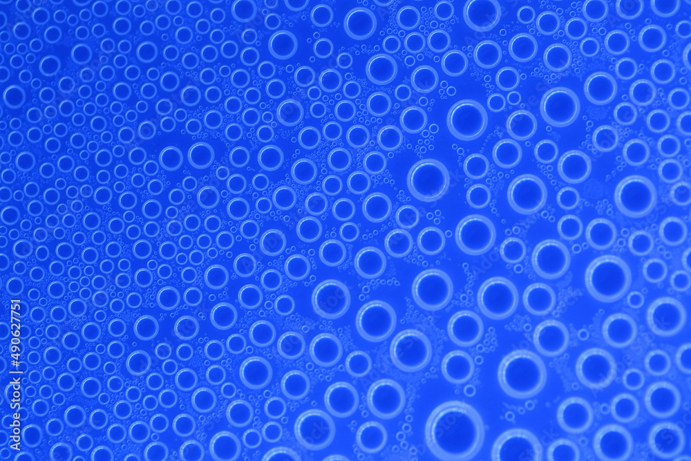 Water bubbles .wallpaper phone. background with round drops in blue tones. Water bubbles and drops texture.blue circles pattern