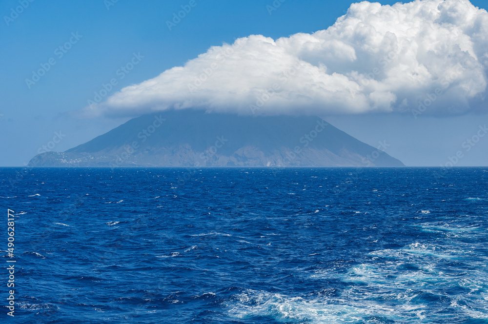 Stromboli island with cloud on the top.