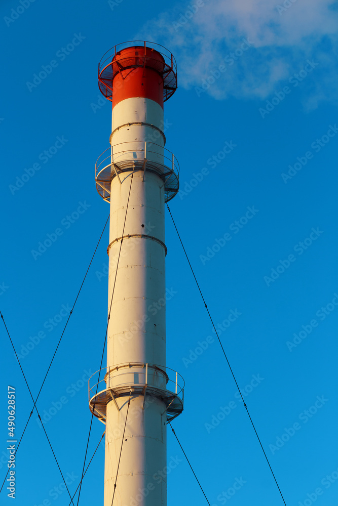 Chimneys of the power plant against the sky.
Chimneys of the power plant against the sky.