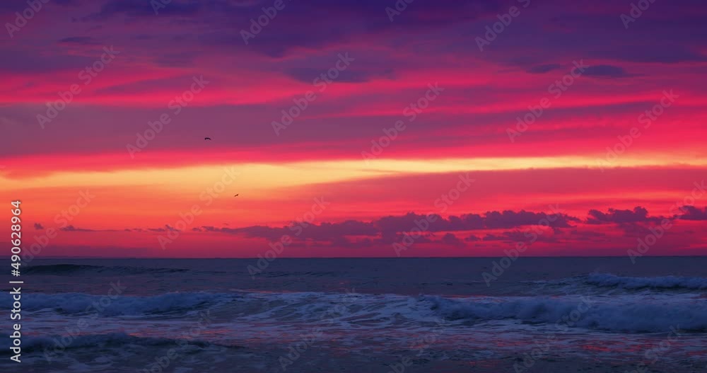 Colorful ocean beach sunrise. Sunset over the sea and coast. Colorful ocean beach sunrise. Sunset over the sea and coast.