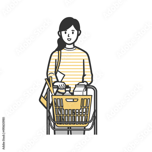 カートをおしながら買い物をする女性