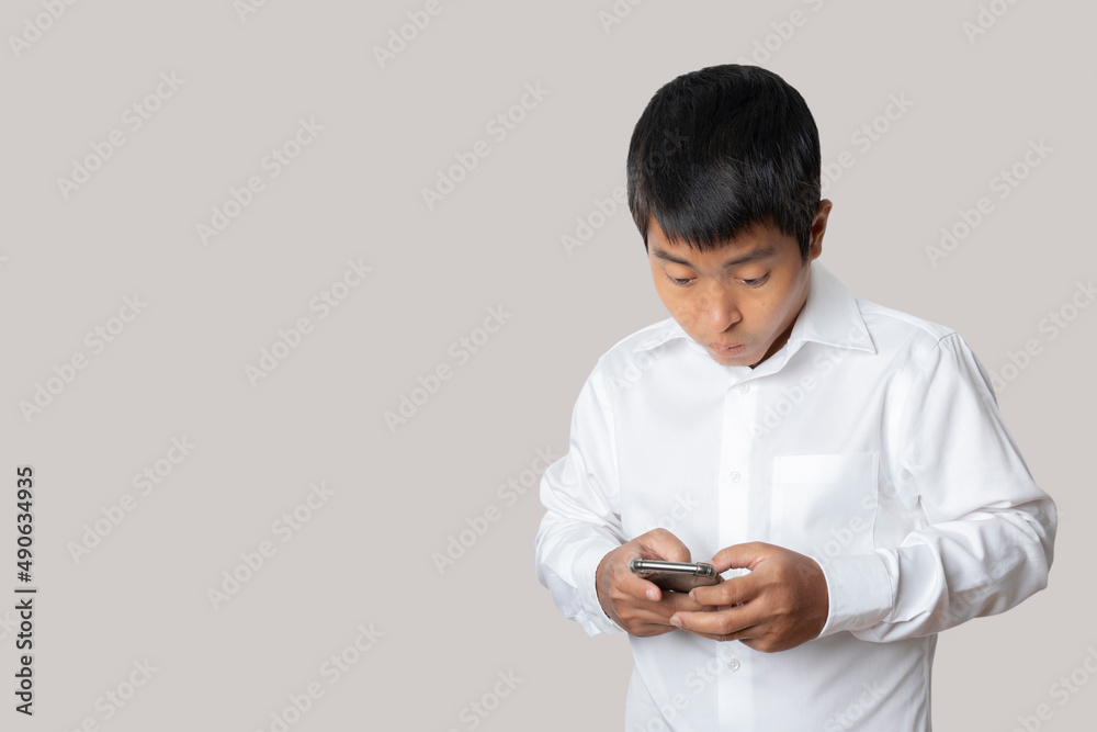 Portrait of businessman using smartphone isolated on gray background. Portrait of businessman using smartphone isolated on gray background.