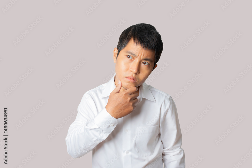 Portrait of businessman thinking, question, thoughtful gesture. Portrait of businessman thinking, question, thoughtful gesture.