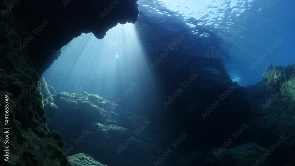 sun ray and sun beam scenery underwater waves on surface of water slow ocean scenery for backgrounds sun ray and sun beam scenery underwater waves on surface of water slow ocean scenery for backgrounds