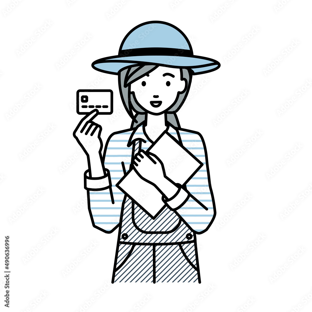 立って書類とカードを手に持つ農家の女性 立って書類とカードを手に持つ農家の女性