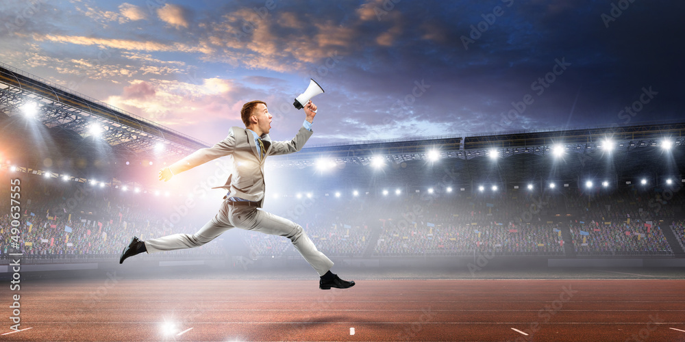 Portrait of energetic businessman running Portrait of energetic businessman running