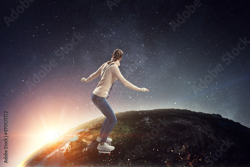 Young woman riding her skateboard