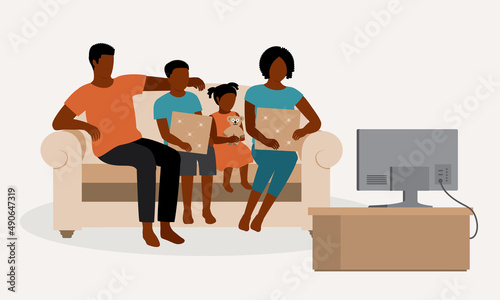Black Family Watching TV Together At Home.