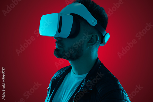 Man experiencing cyberspace in VR glasses