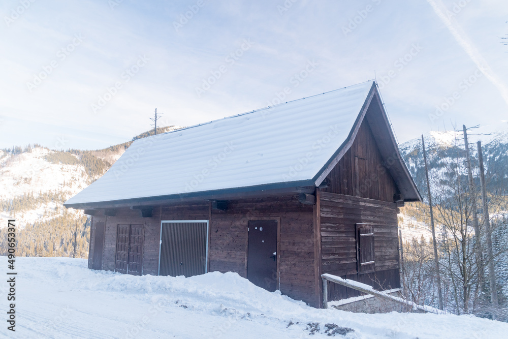 Wooden hut in Tatra mountains in Winter time.