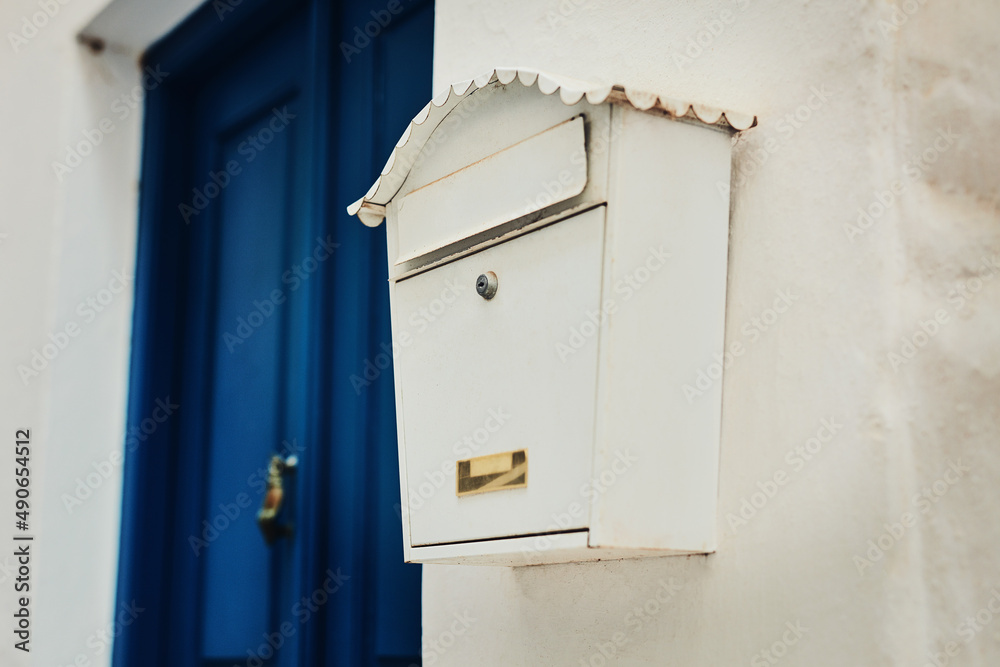 Check your mail. Cropped shot of letterbox on a residential building. Check your mail. Cropped shot of letterbox on a residential building.
