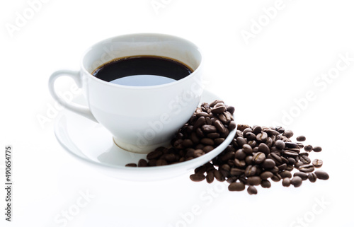 Coffee cup and beans isolated on white background