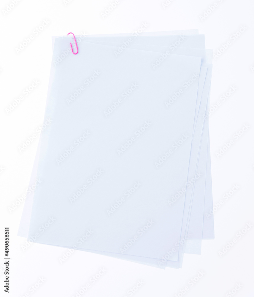 Blank paper with paperclip on white background Blank paper with paperclip on white background