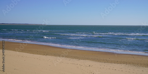 Idyllic tropical sand beach background in web banner header panoramic